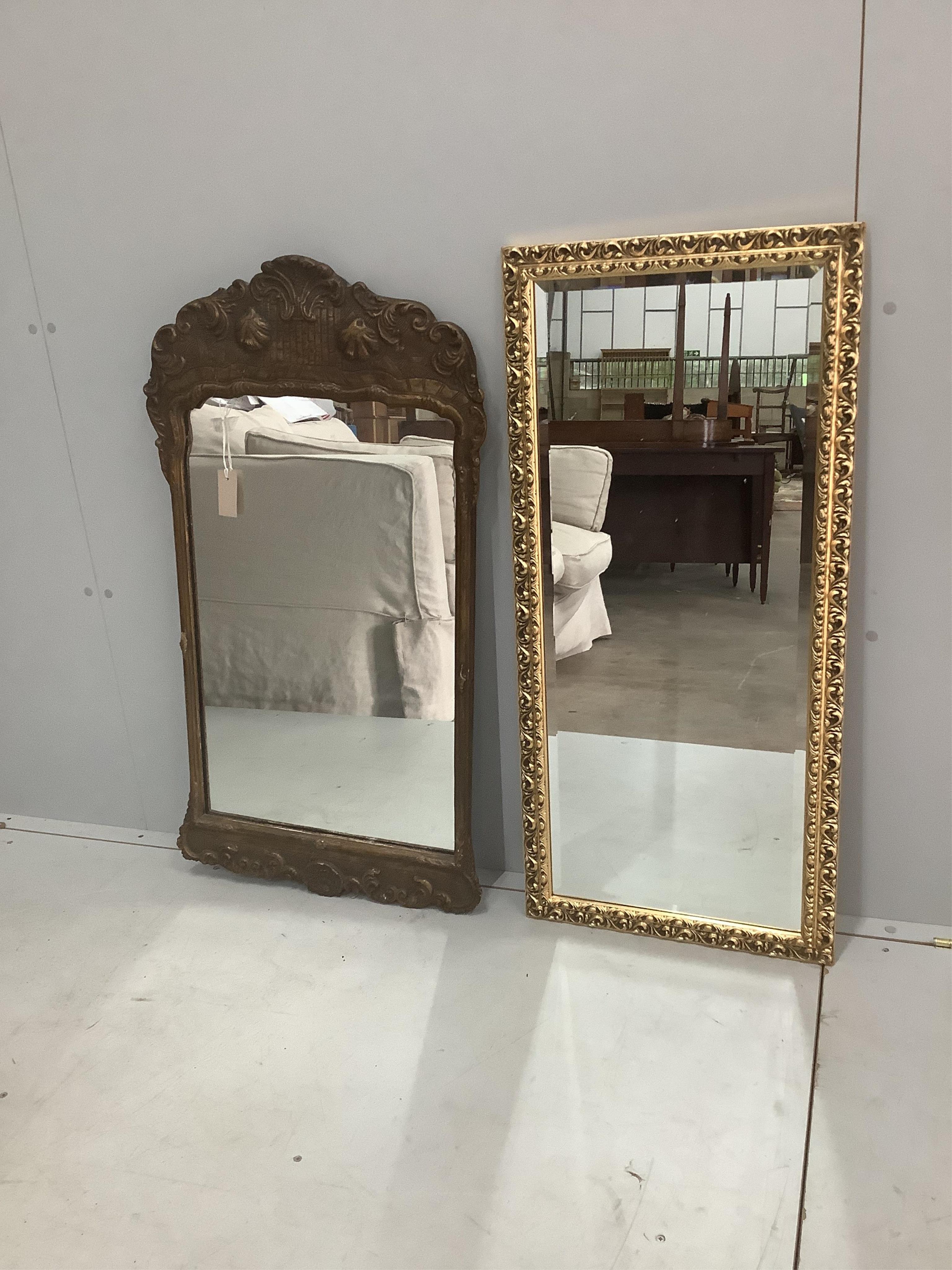 An 18th century style gilt composition wall mirror, width 54cm, height 100cm together with a reproduction Victorian style wall mirror. Condition - fair